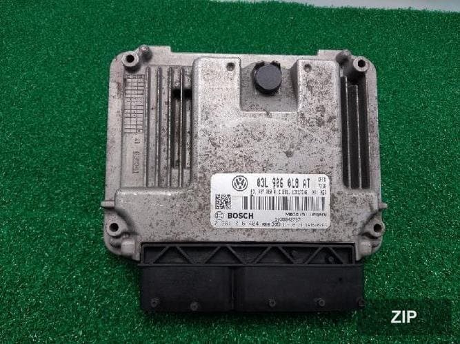Блок управления двигателем ECU 03L 906 018 AT 8