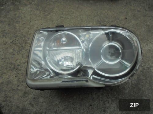 Фара передняя левая HID 5701061AA/04815761AD