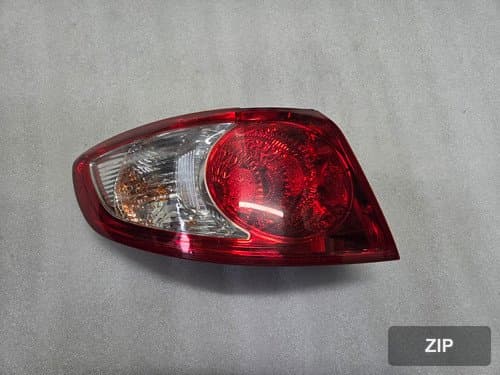 Задний фонарь левый Santafe CM 924012B000
