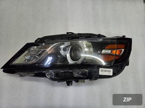 Фара передняя левая HID 8-контактная 23405240