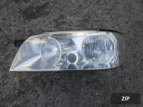 Фара передняя левая HID 921103B011 (стекло)