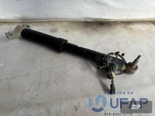 Амортизатор задний левый LC5C18W003MB LC5Z18125AB